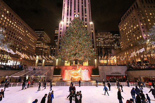 New York City, NY, USA - December 1, 2016: The Rockefeller Center skating rink and Christmas tree.