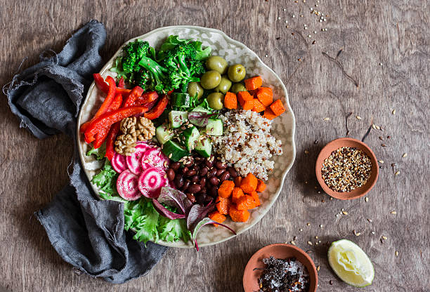 istock Vegetarian buddha bowl. Raw vegetables and quinoa 627413910
