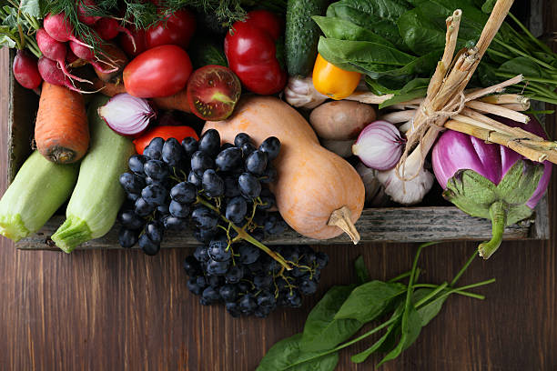 istock Organic fruits and veggies top view 627416060