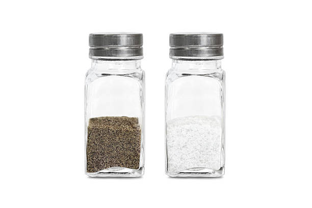 istock glass bottle with ground pepper and salt 627418418