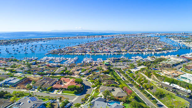 Newport Harbor A beautiful view of Newport Harbor in Orange County, Southern California newport beach california stock pictures, royalty-free photos & images