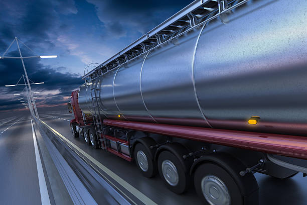 istock 3D rendering of Tanker on the road at dawn 627427476
