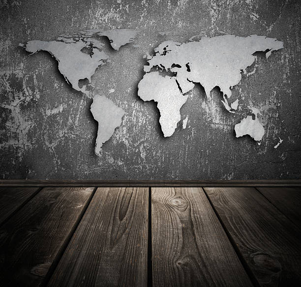 istock World map on concrete wall and wooden flooring 627428952