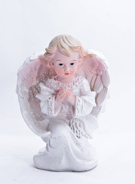 istock little Christmas angel on a white background 627430616