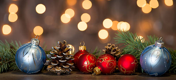 istock Christmas background with decorations on wooden board 627431146