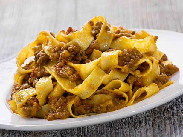 istock rustic traditional italian pappardelle bolognese 627432466