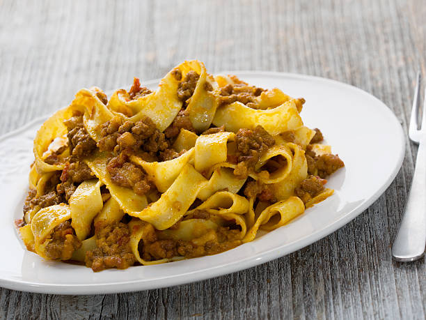 istock rustic traditional italian pappardelle bolognese 627442056