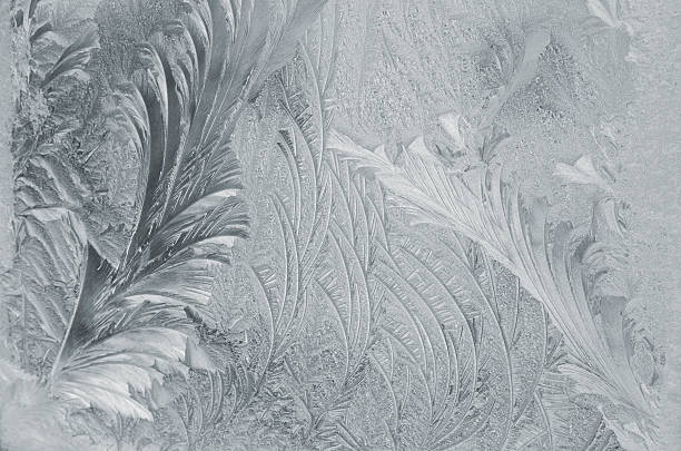 ice pattern on winter glass stock photo