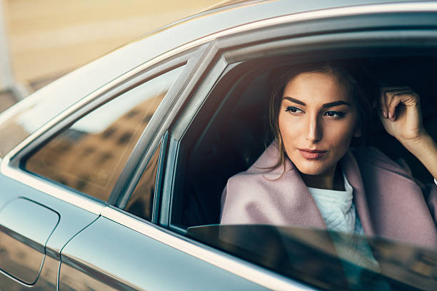 istock Beautiful Woman Inside Of A Car 627443378