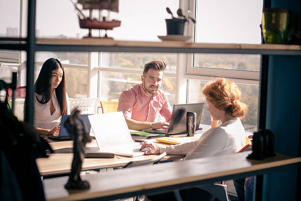 istock Business people working in board room in office 627453882