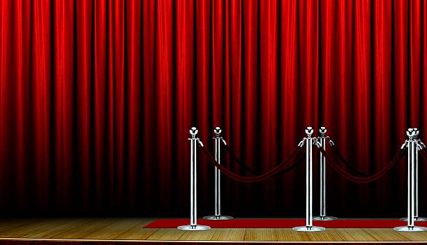 istock Red carpet on stage and curtain 627457092