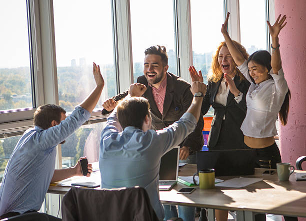 istock Business people showing team work in office 627457680