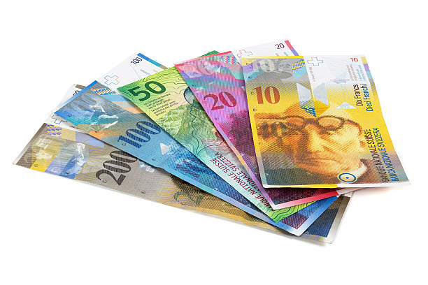 istock Set of swiss franc banknotes on white background 627459200
