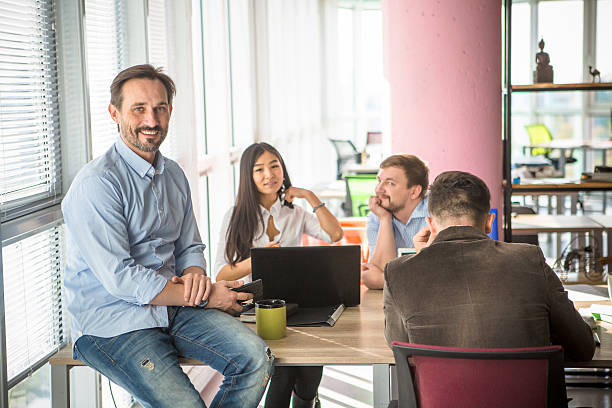 istock Business people working in board room in office 627459258
