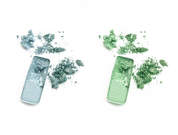 istock Smashed blue and green eye shadow make up palette isolated 627462062
