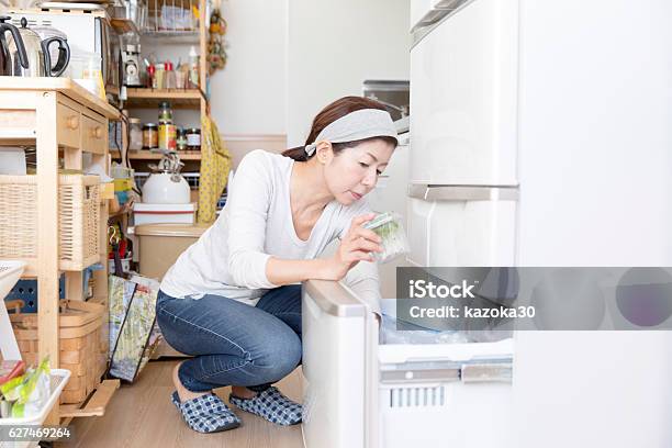Remove The Empty Food In The Refrigerator Stock Photo - Download Image Now - Freezer, Japanese Ethnicity, Kitchen