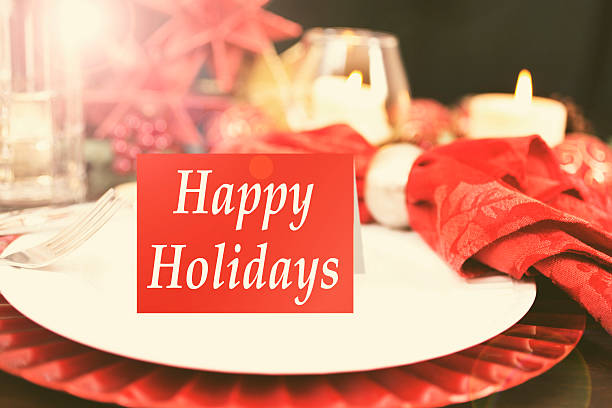 istock Dining table place setting with Christmas holiday decorations. 627470436
