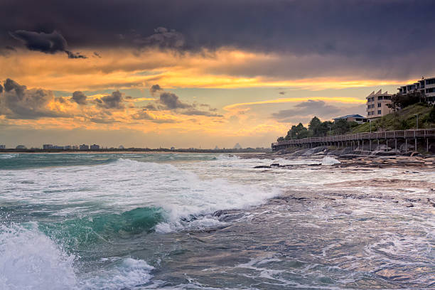 istock Sunset Over The Waves Of The Pacific 627472170