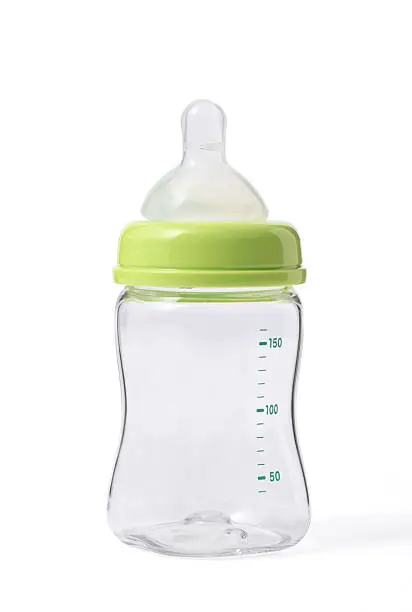 Photo of Isolated shot of empty baby bottle on white background