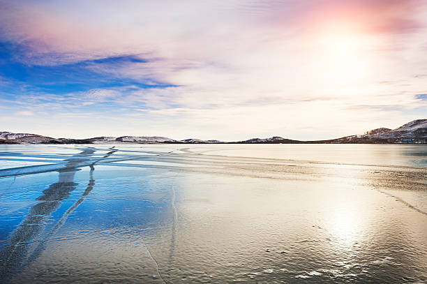 istock Ice on the frozen lake. 627475736