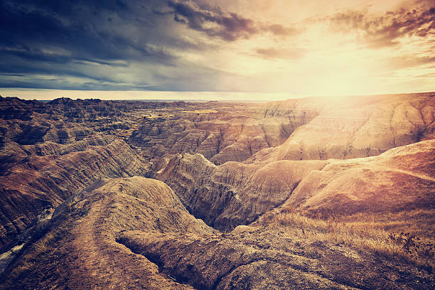 Vintage toned scenic sunset over Badlands National Park, South Dakota, USA.