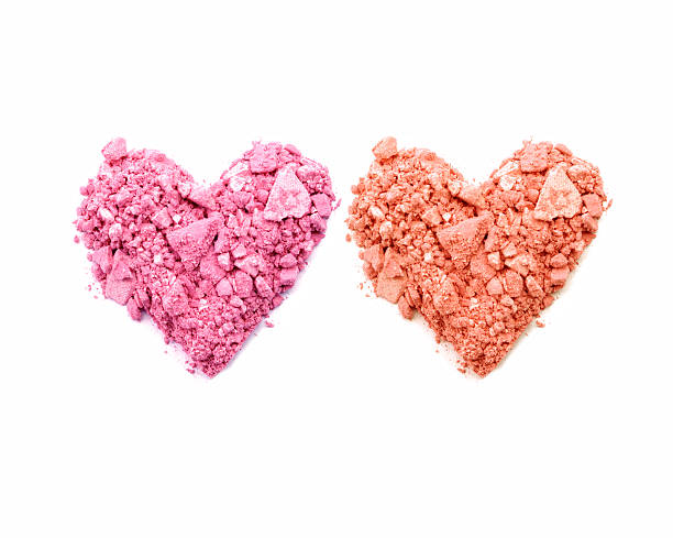 istock Heart shape of crushed eyeshadow isolated on white 627476040