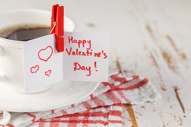 istock Morning coffee with Valentine's day card 627476172