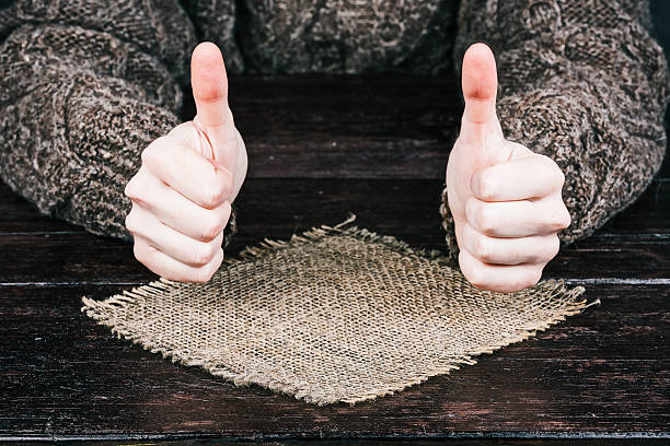 Hands above sackcloth