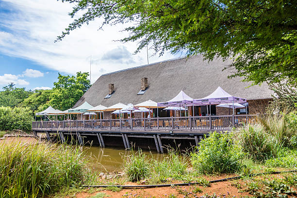 Restaurant on a deck overlooking a lake in Somerset West, South Africa