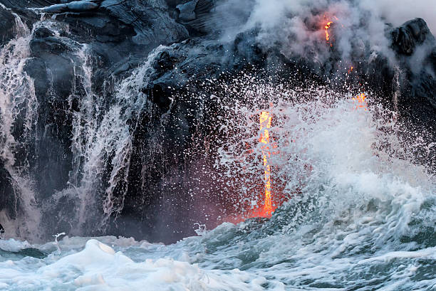 istock Molten lava flowing into the Pacific Ocean on Big Island 627499382
