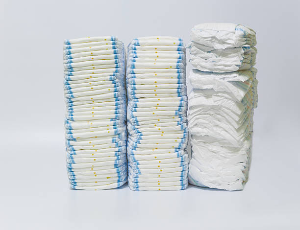istock Stacks of diapers on white background. 627502056