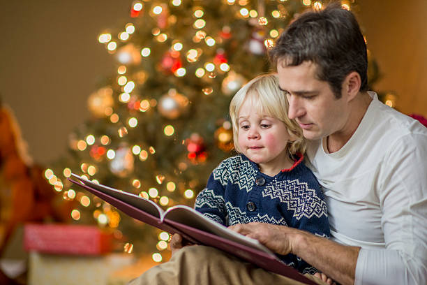 istock Reading Books on Christmas Eve 627502518