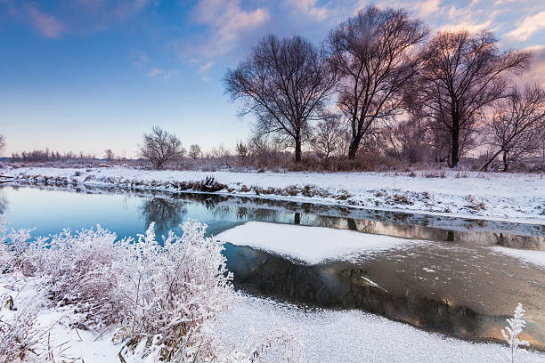 istock Dawn over the river in winter morning 627510398