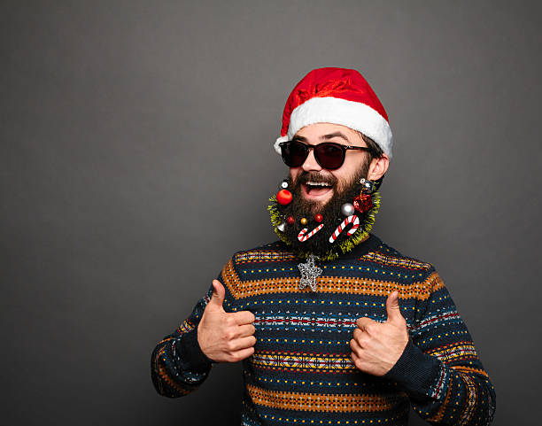 istock bearded man with decorated beard showing ok sign 627510890