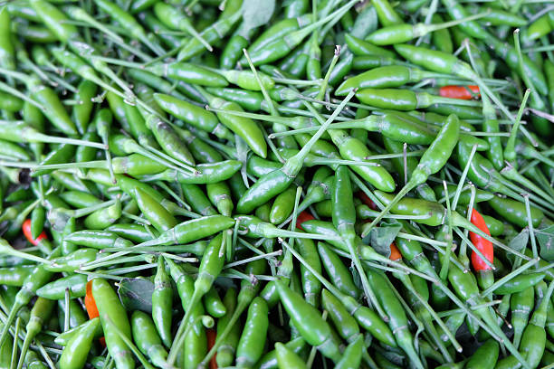 istock Red and green chillies mixed 627511140