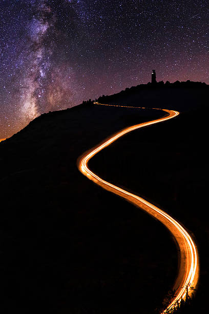 istock Starry night and Milky Way under lighthouse 627511622