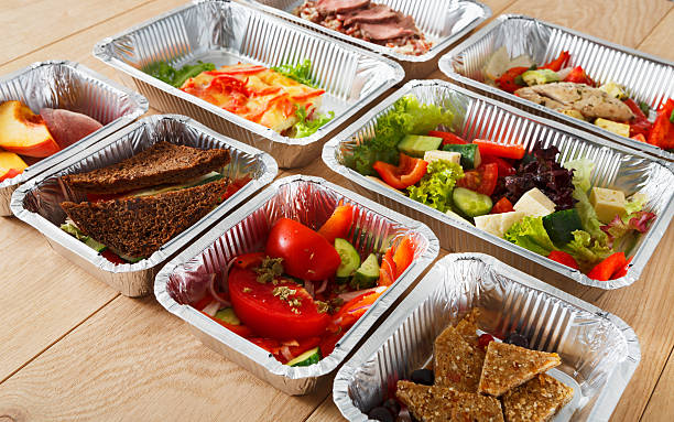 istock Healthy food in boxes, diet concept. 627522284