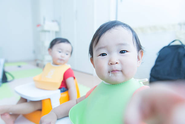 istock Cute baby with a meal 627540346