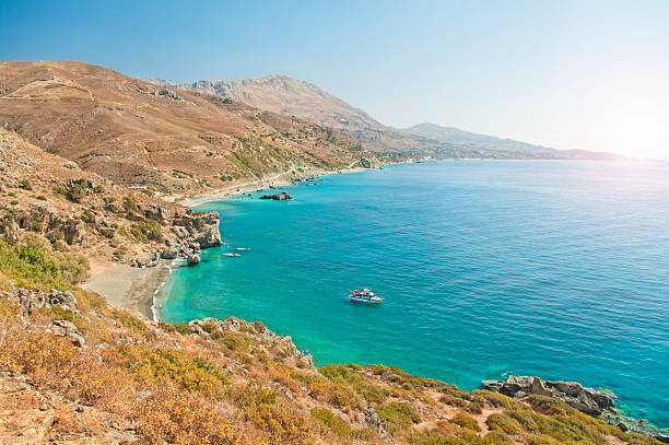 istock beautiful beach surrounded by mountains from above 627540370