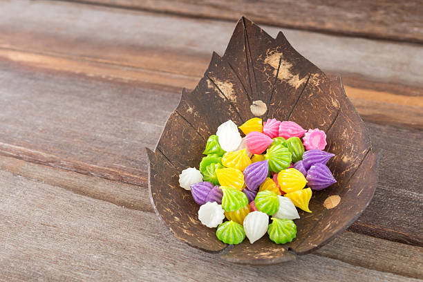 istock Aalaw candy thai dessert colorful in dish on wood background 627543726