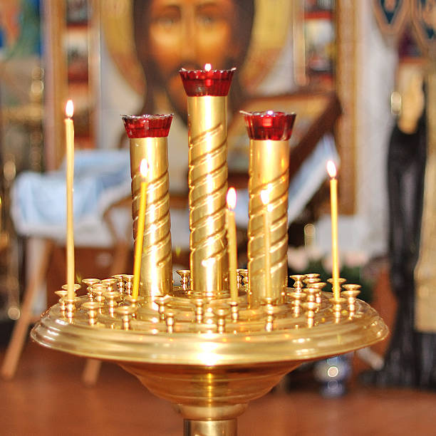 candlesticks in the church Orthodox church, candlesticks in the church closeup kneelers stock pictures, royalty-free photos & images