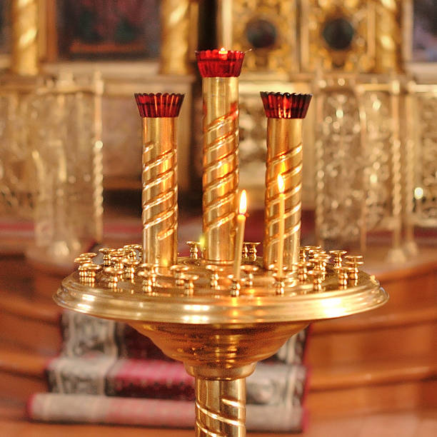 istock candlesticks in the church 627558396