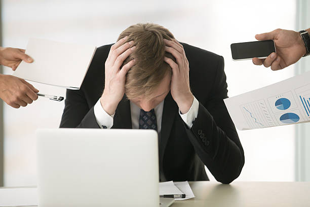 istock Young businessman hiding his head 627559352