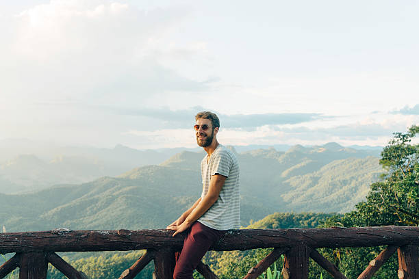 istock Man in mountains at sunset in Thailand 627560210