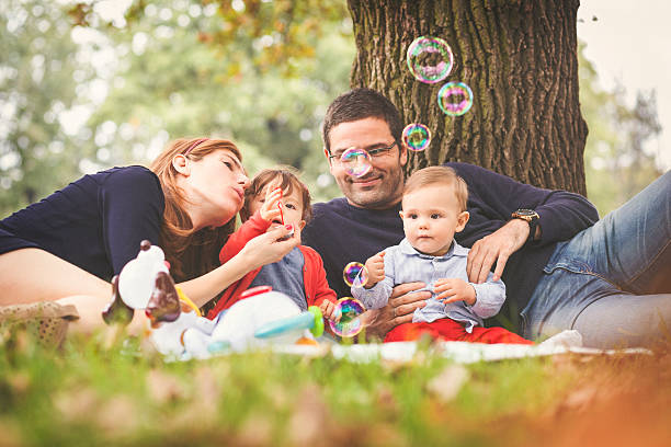 istock Happy parents with their children 627560440