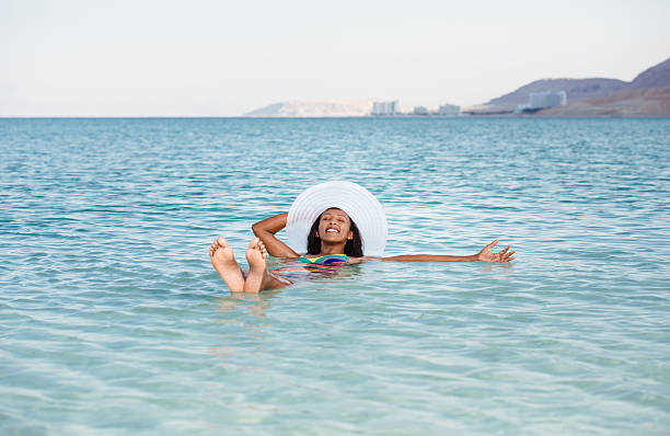 istock Woman on perfect vacation beach. 627560704