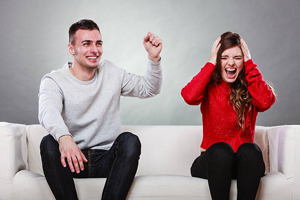 istock Furious wife and happy husband. Disagreement 627560728