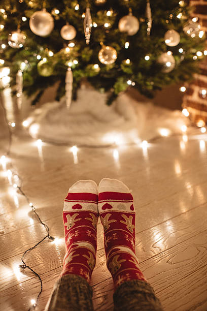 istock Fairy lights and Christmas socks 627574974