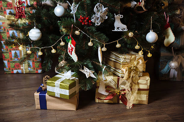 istock Presents, gift under the Happy New Year and Christmas tree 627575058