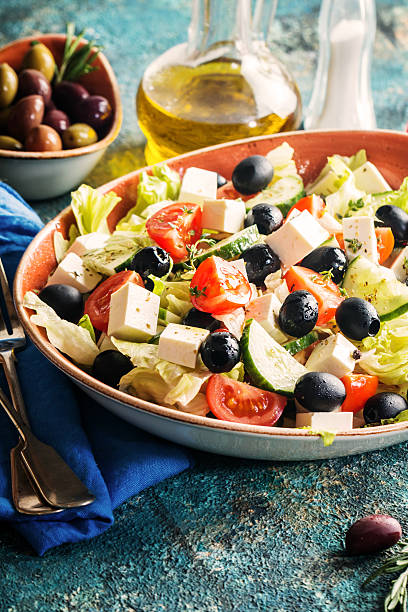 istock Greek salad with fresh vegetables 627583896